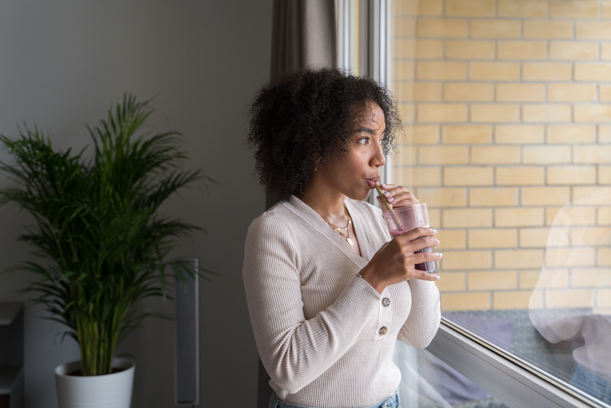 soy protein isolate woman drinking protein shake