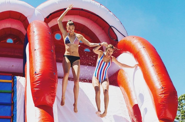Taylor Swift and Karlie Kloss on inflatable slide