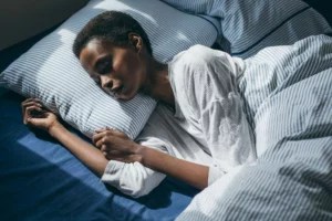 What your go-to sleeping position says about you, according to the pros
