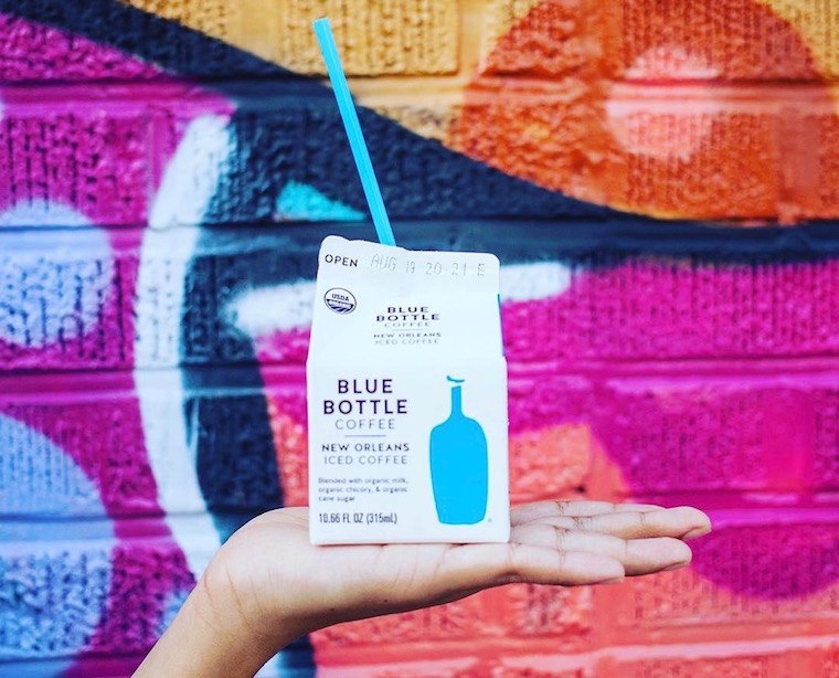 blue bottle coffee against colorful wall