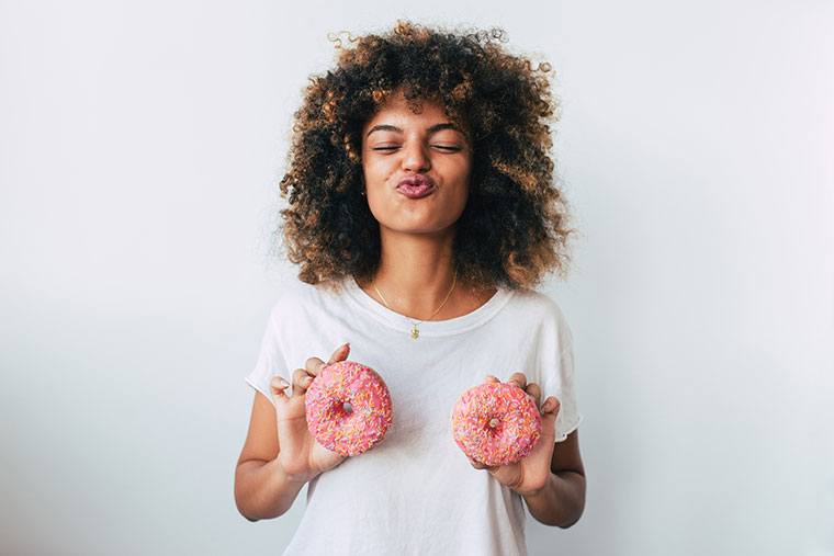 Woman with doughnuts