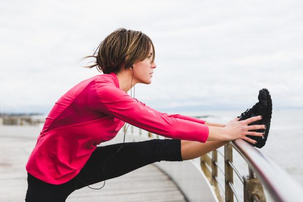 6 Stretches Every Runner Should Do Before and After a Workout