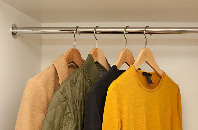Are wire hangers really bad for your clothes? | Well+Good