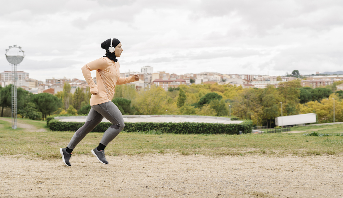 Arab athlete woman enjoying running outdoors, to illustrate how long should you run