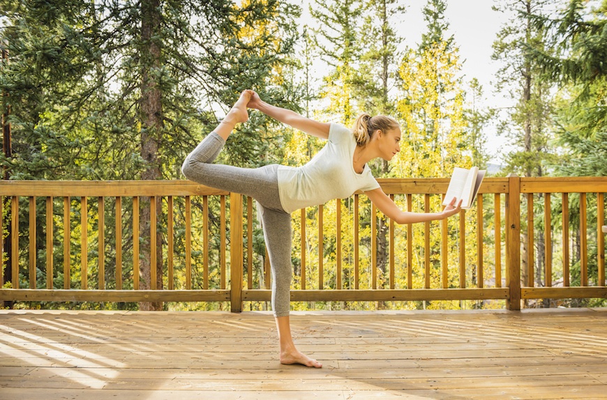 Woman reading and yoga