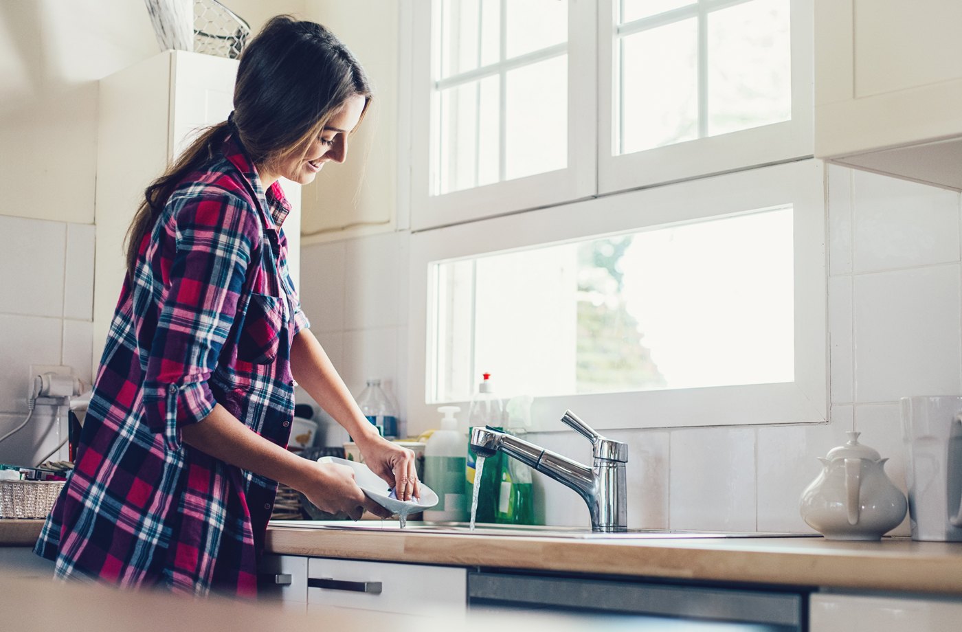 The one germy mistake you're making when hand-washing your dishes
