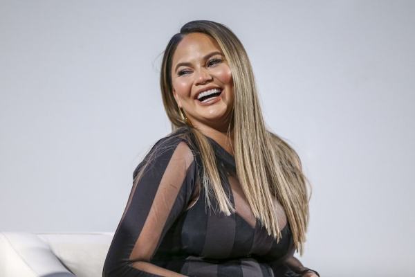 Chrissy Teigen's Pro Tip for Seeding a Pomegranate—Without Staining Everything Red