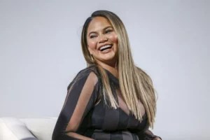 Chrissy Teigen's pro tip for seeding a pomegranate—without staining everything red