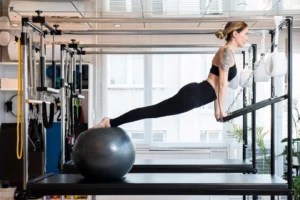 Get In an Intense Workout *Anywhere* Using This Completely Collapsable Pilates Reformer