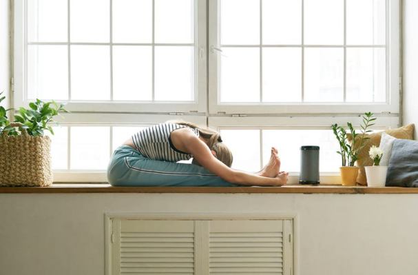 2 Yoga Moves You Can Do at Your Desk to Ease Neck and Back Tightness
