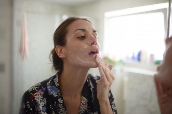 How Hard to Scrub Your Face While Cleansing, According to a Dermatologist