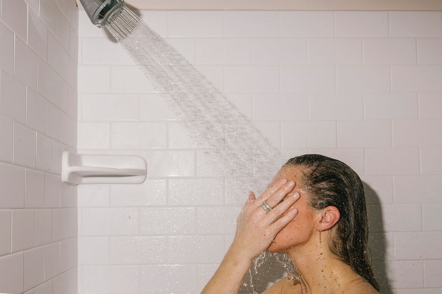 Should you wash your face in the shower? | Well+Good
