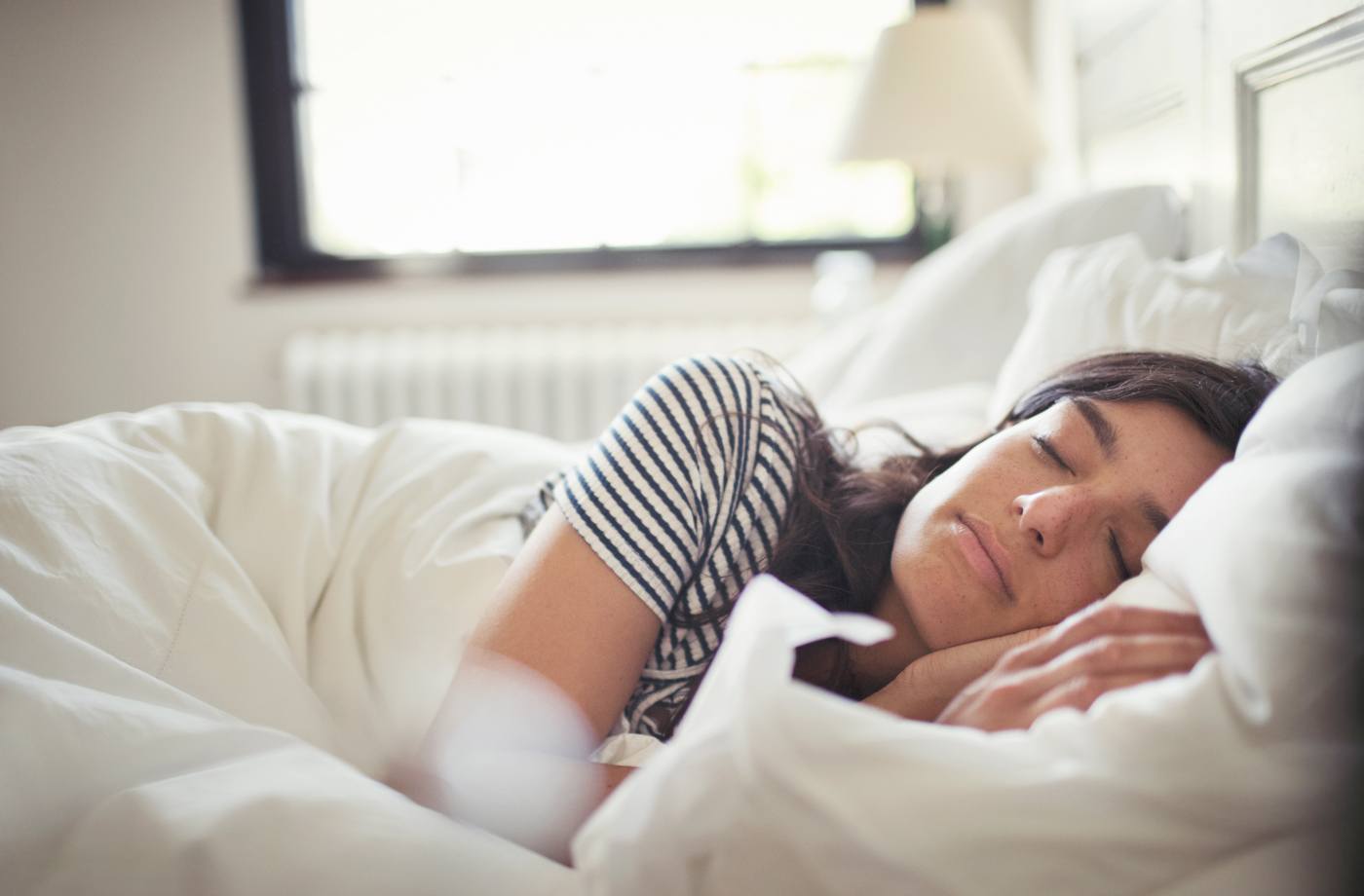 woman sleeping in bed sleep mortality study