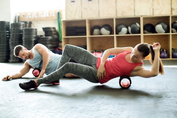 A Fitness Instructor Reveals When, Exactly, You're Supposed to Be Foam Rolling