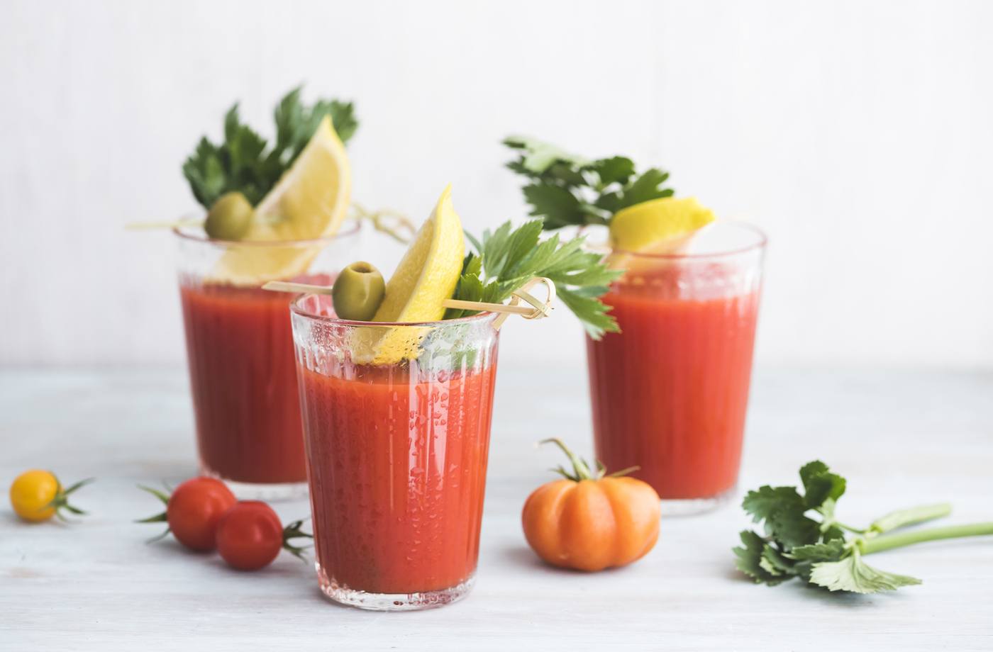 tomato juice benefits bloody mary drinks on a white counter