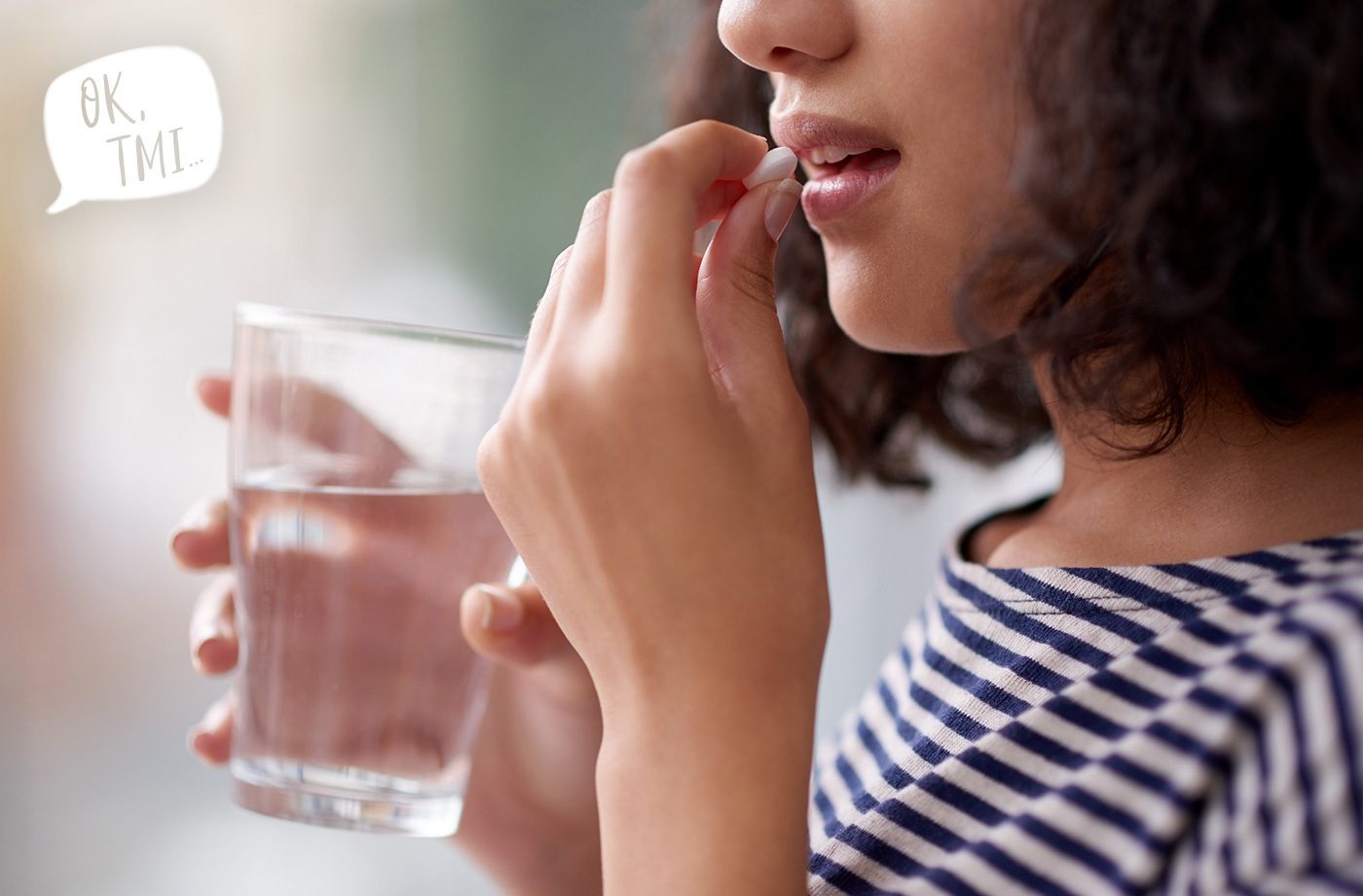 woman taking pill with a glass of water what is emergency contraception