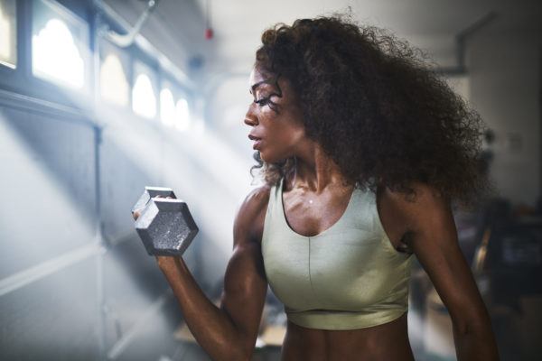 When to Use Bodyweight Versus Dumbbells to Hit Your Fitness Goals