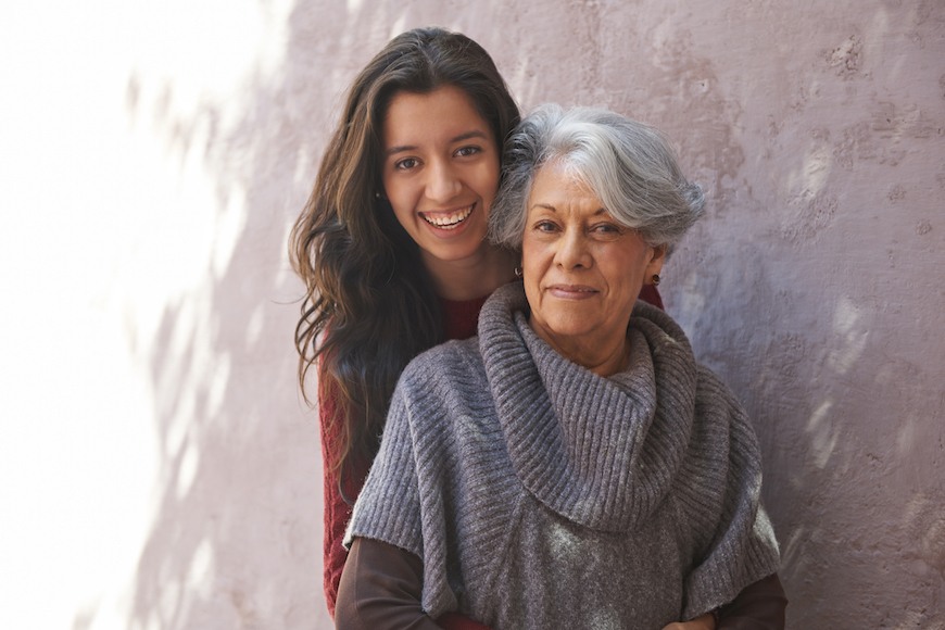 millennial family caregivers woman posing with her mom