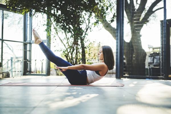Why Sitting Still in Your Workout Is Just As Effective As Your Sweatiest Moves