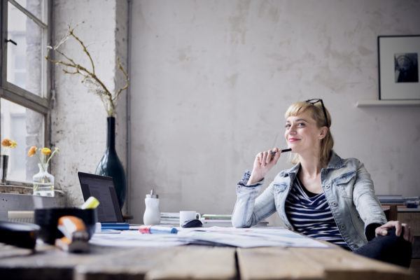 These Are the Absolute Worst Ways to Sit at Your Desk, According to a Physical...