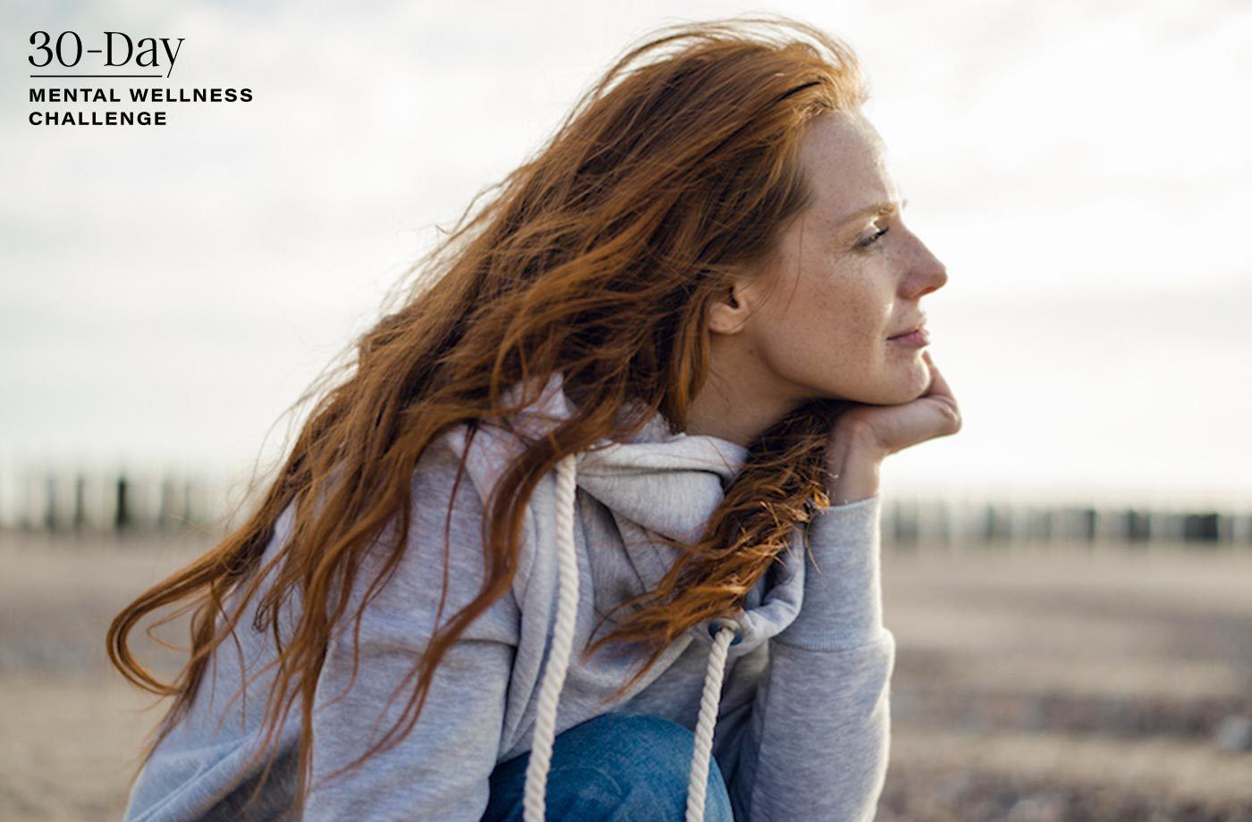 common stress myths woman in sweatshirt looking off into distance