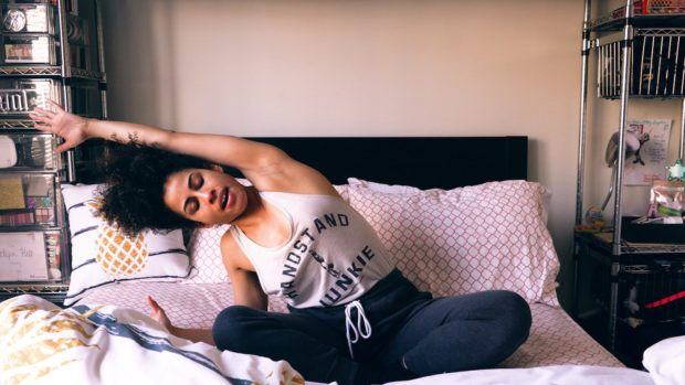 Turn Your Bed Into a Massage Table With This 5-Minute, Full-Body Stretch for Better Zzzs