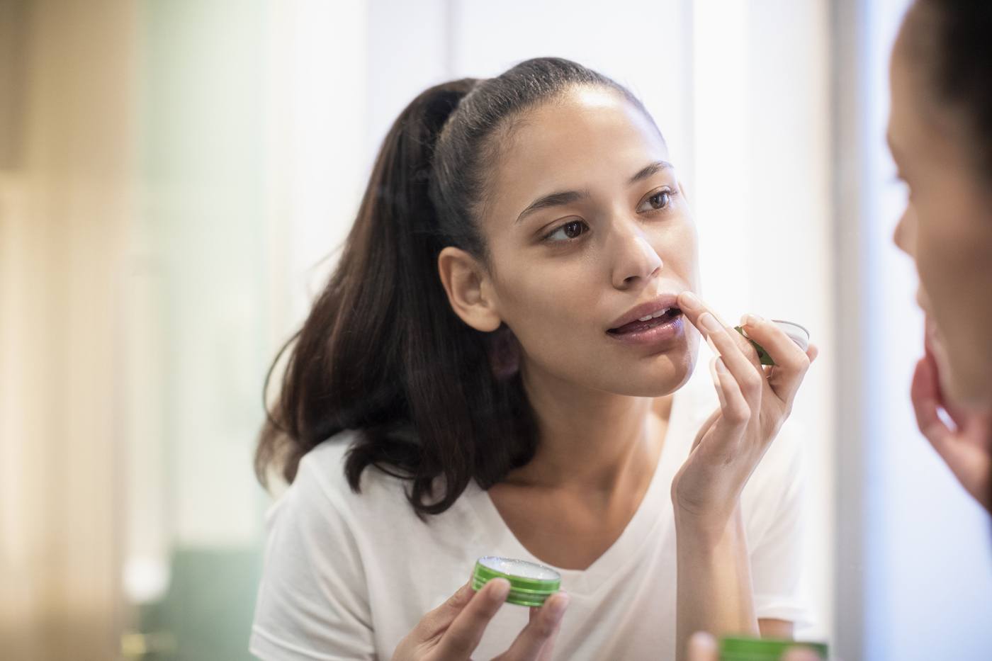 A derm reveals: How often should you apply lip balm | Well+Good