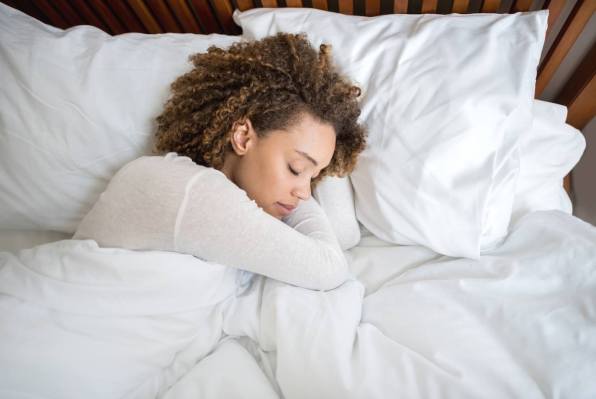 Sleep Experts Reveal How Your Go-to Snoozing Position Can Impact Your Posture