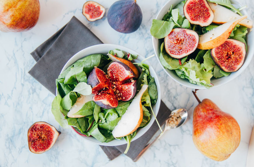 iron rich foods list spinach salad with figs and pears in bowls