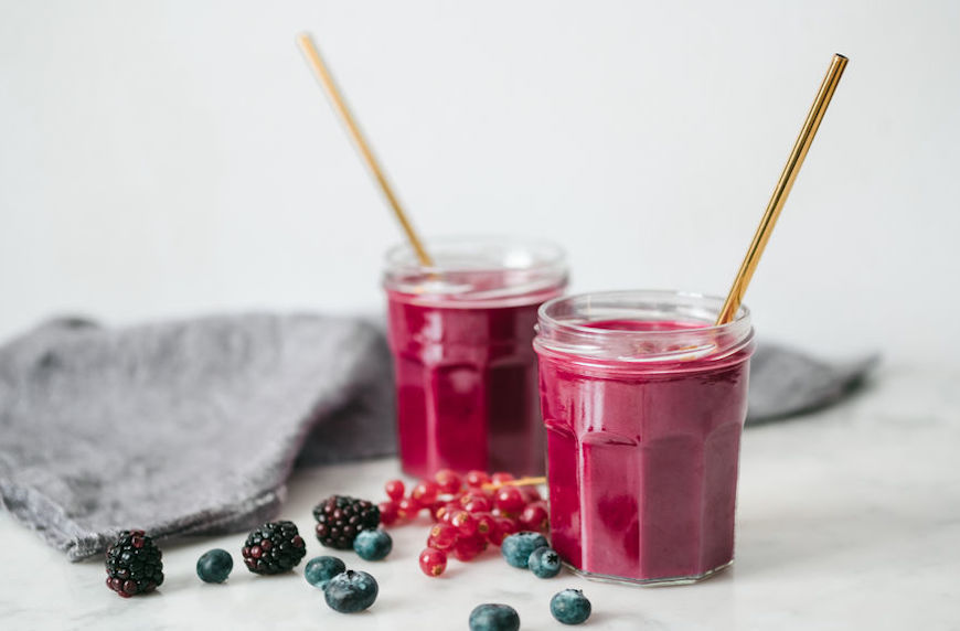 cut out sugar berry smoothies in mason jars with reusable metal straws