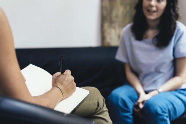 3 Therapists Get Real About What They're Actually Writing Down While You're Talking