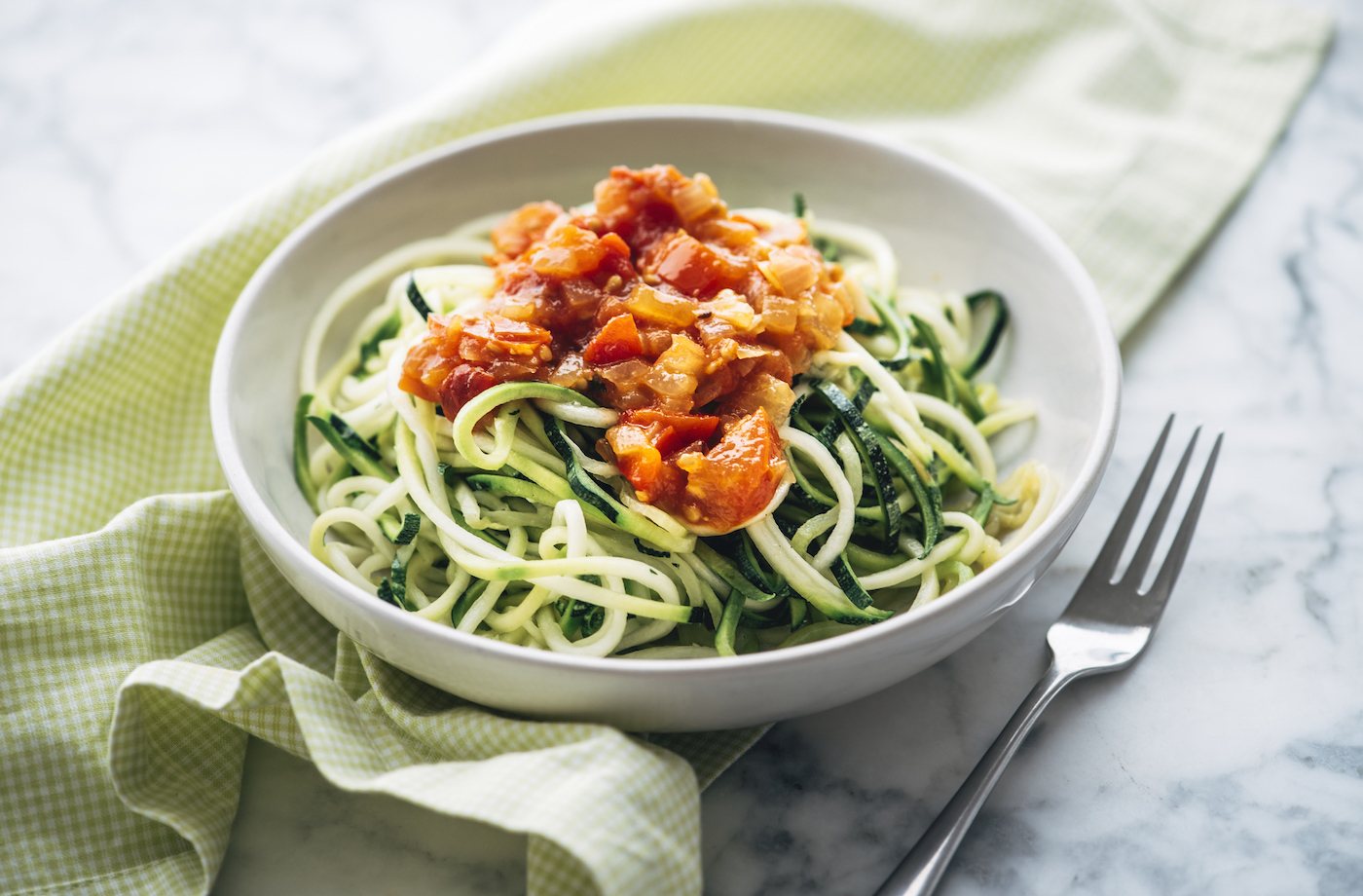 whole30 meal ideas and macros suggestions zucchini noodles with fresh tomato sauce in bowl
