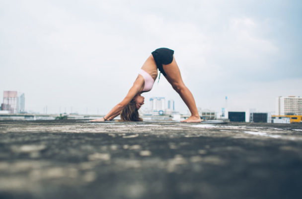 This Physical Therapist-Approved downward dog variation Gives Your Core Extra Love
