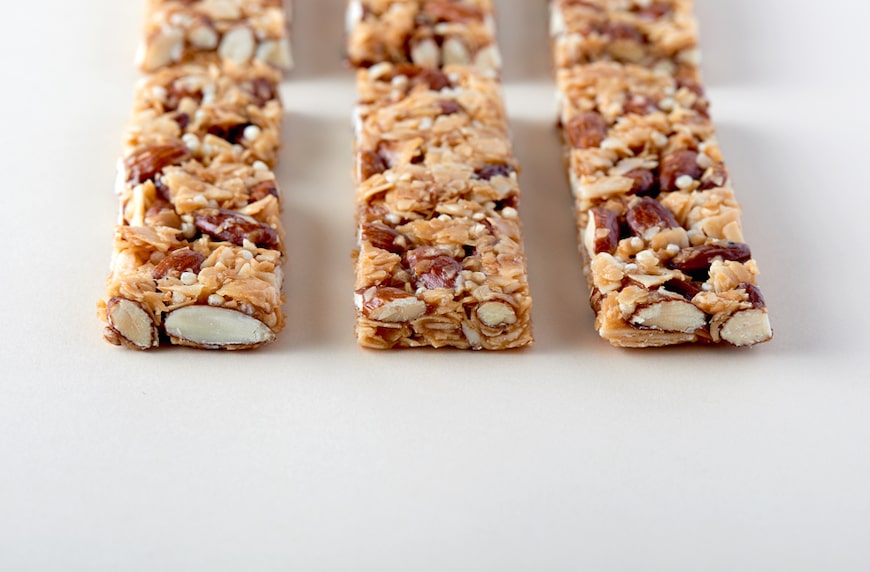 9 healthy desk snacks nutritionists reach for at work | Well+Good