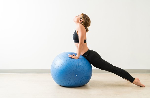Your Secret Weapon for Back Strength Is a Stability Ball—Here’s Exactly How to Wield It