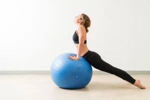 Your secret weapon for back strength is a stability ball—here’s exactly how to wield it