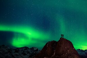 Watch the northern lights via livestream to—at the very least—transport your mood to a brighter level