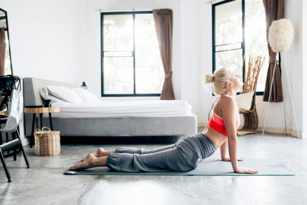 8 Beginner Stretches to Move Through If You’re Far From Flexible