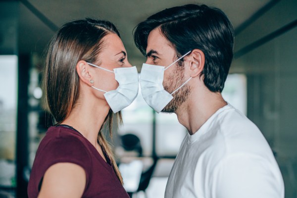 Is Wearing a Mask During Sex Really Safer During a Pandemic? Here’s What a Doctor...