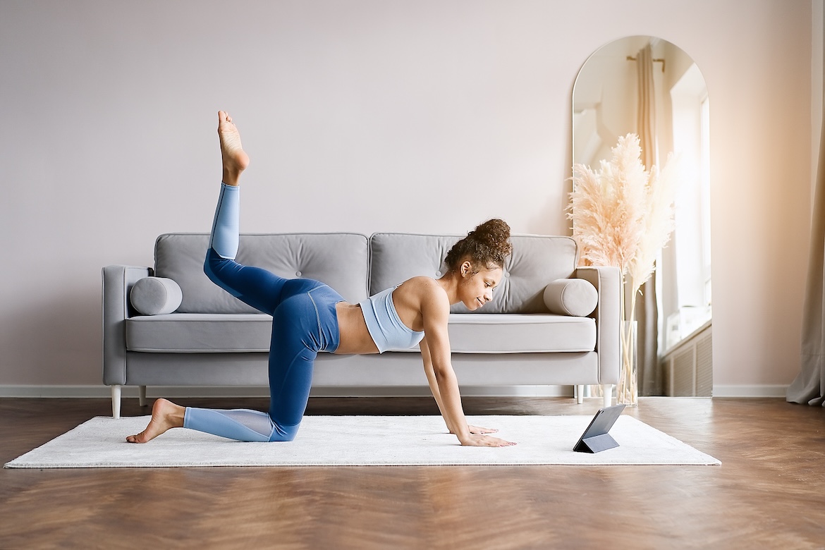Person doing hardest Pilates moves in living room