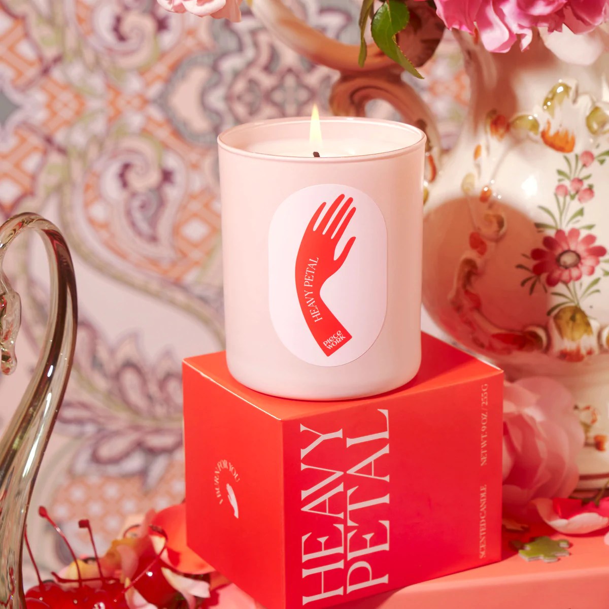 piecework puzzles heavy petal candle on top of its box, long-lasting candles