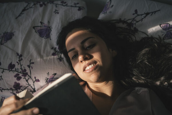 Research Shows Reading Before Bed Can Lead to Better Sleep—And These Bookworm-Perfect Products May Help,...