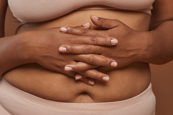 Why You Should Massage Your Stomach for Better Health, According to a Licensed Massage Therapist