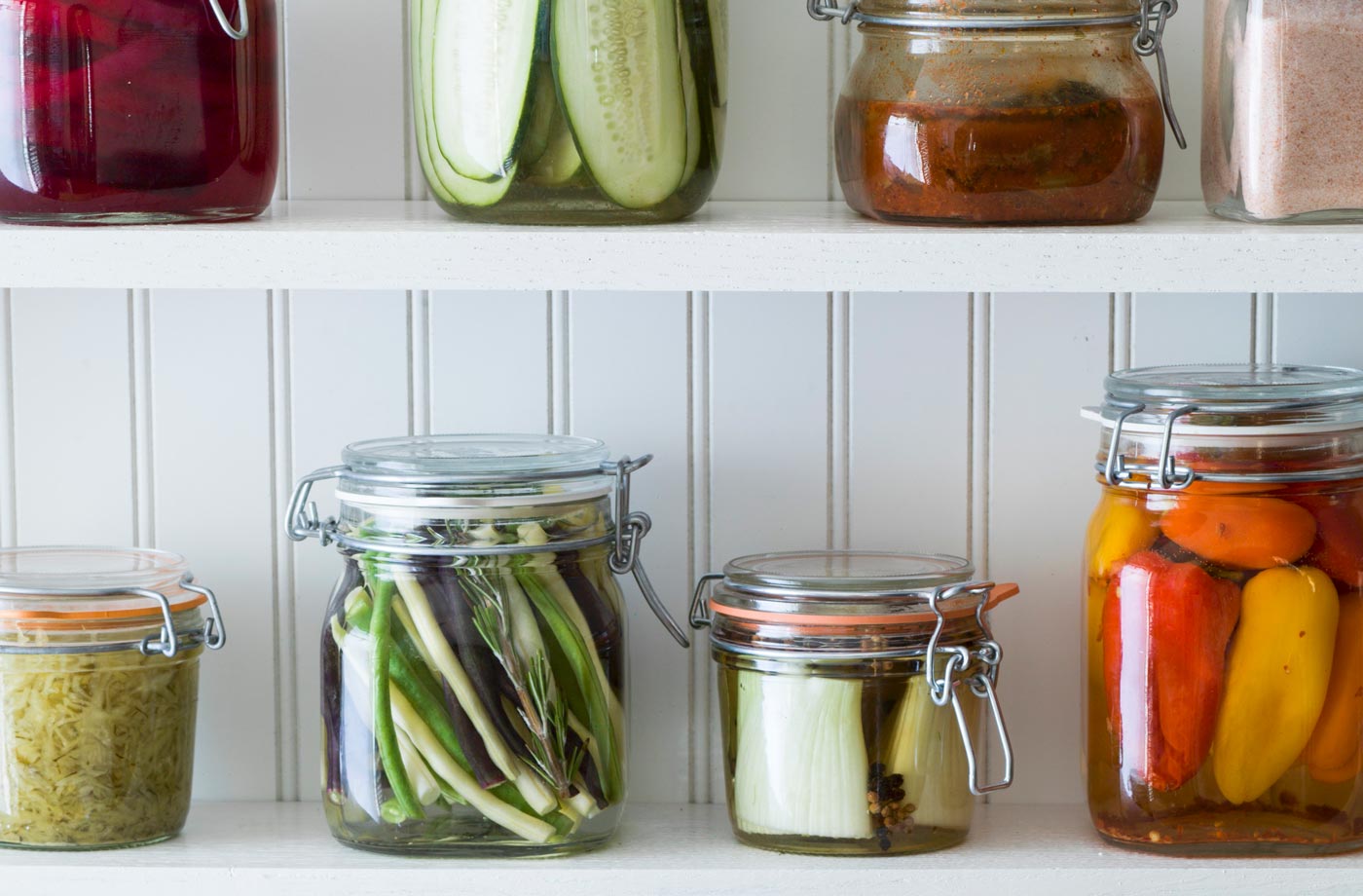 glass jars with pickled vegetables