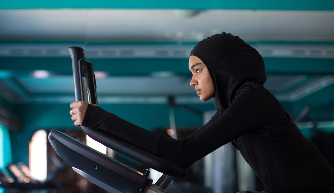 woman using treadmill for workout motivation