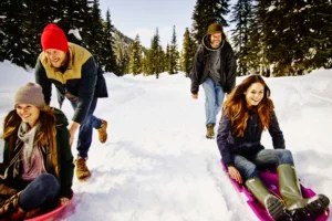 The Best Snow Sleds for Adults, Because Reliving Your Childhood Snow Days Is a Great Form of Self Care