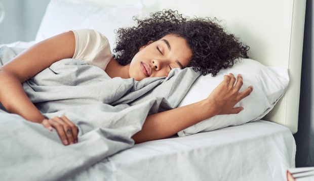 Your Alarm Clock Might Be Making You Feel Even *More* Tired—Here's How To Wake Up...