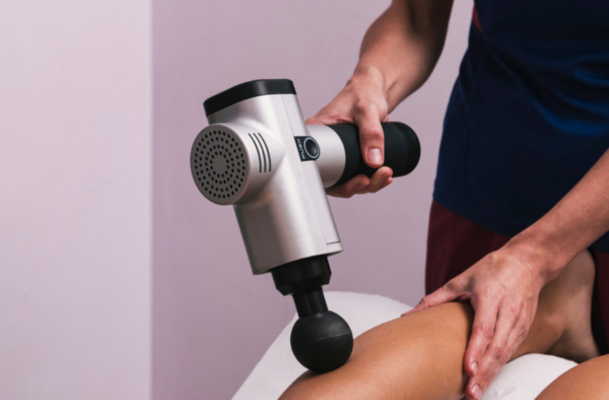 Should You Skip the Massage Gun? A PT Explains the Pros and Cons
