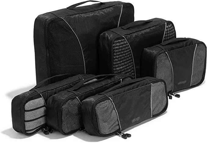 photo of six black packing cubes for travel