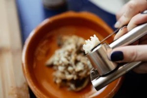 A Chef Shares Why a Garlic Press Is One of the Best Cooking Tools For Making Flavorful Meals